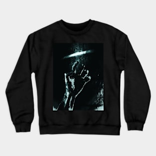 Digital collage and special processing. Person looking on his hand. Bizarre, dark. Grayscale and aquamarine. High contrast. Crewneck Sweatshirt